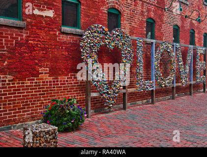 Word love and a heart made from padlocks, Distillery District, Toronto, Ontario, Canada Stock Photo