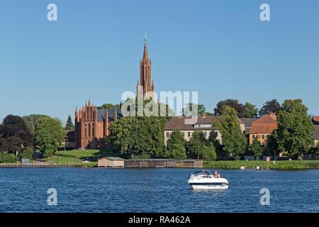 Monastery Church and lake, Malchow, Mecklenburg Lake District, Mecklenburg-Western Pomerania, Germany Stock Photo