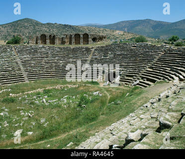 Turkey. Aphrodisias. Ancient Greek Classical city. The Stadium. It was built in the later 1st century AD. Originally designed for athletic contests. Panoramic view of the east end of the building, turned into an amphitheatre and arena specifically designed for Roman-style entertainments, ca. 400 AD. Stock Photo