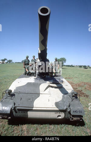 1972 - Crewmen of an M110 203 mm self-propelled howitzer man their positions. Stock Photo