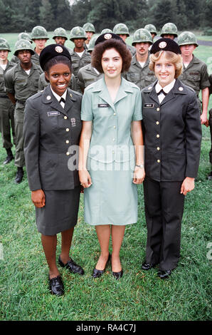 1971 - Female enlisted personnel model three different uniform styles. Stock Photo