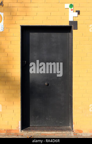 Black door, Pobelnou, Poblenou, Barcelona, Spain. Stock Photo