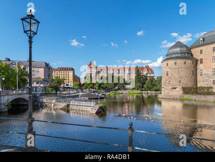 The city centre and Svartån river with Orebro Castle to the right, Orebro, Närke, Sweden Stock Photo