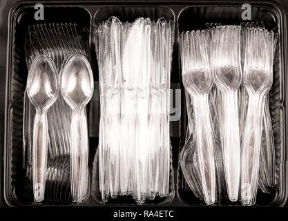 Plastic cutlery, disposable cutlery, knives, forks, spoons, plastic waste, transparent, transparent Stock Photo
