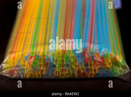 Plastic drinking straws, plastic waste, different colours and sizes Stock Photo
