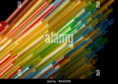 Plastic drinking straws, plastic waste, different colours and sizes Stock Photo
