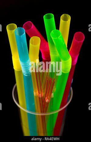 Plastic drinking straws, plastic waste, different colours and sizes Stock Photo