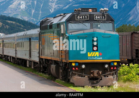 Via Rail Canada train in Jasper village, Jasper National Park, Alberta, Canada Stock Photo