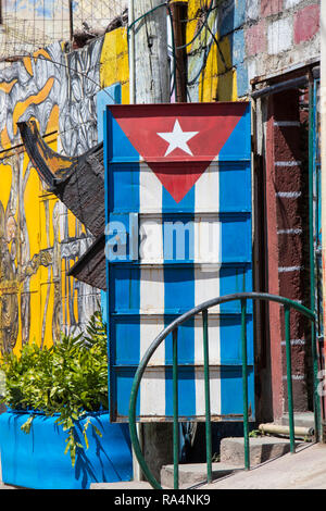 cuban flag painted on metal door in street in havana cuba Stock Photo