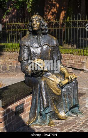 Olsztyn, Warmian-Masurian / Poland - 2018/06/16: Renaissance astronomer Nicolaus Copernicus monument in historical quarter of Olsztyn old town Stock Photo