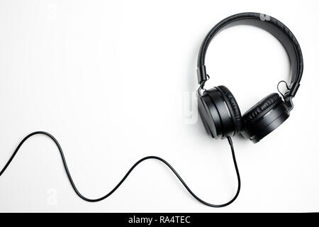 Black headphones isolated on the white background Stock Photo