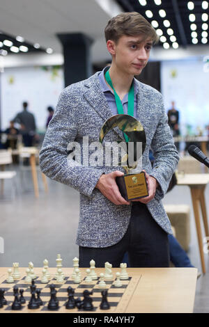 St. Petersburg, Russia - December 30, 2018: Grandmaster Daniil Dubov,  Russia holding the golden cup of World Rapid Chess Championship 2018 during  awar Stock Photo - Alamy