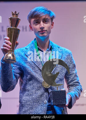 St. Petersburg, Russia - December 30, 2018: Grandmaster Daniil Dubov,  Russia holding the golden cup of World Rapid Chess Championship 2018 during  awar Stock Photo - Alamy