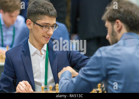 GM Alireza Firouzja being distracted by a camera flash at the FIDE