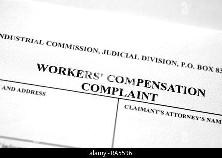 Worker's compensation form complaint for injured worker Stock Photo