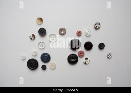 Collection of various buttons isolated on white background from a high angle view Stock Photo