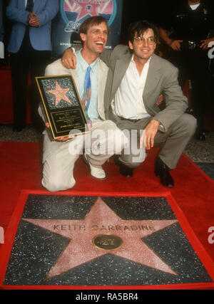 HOLLYWOOD, CA - JULY 15: Actor Keith Carradine and brother actor Robert Carradine attend ceremony for his Star Ceremony on July 15, 1993 on Hollywood Walk of Fame in Hollywood, California. Photo by Barry King/Alamy Stock Photo Stock Photo