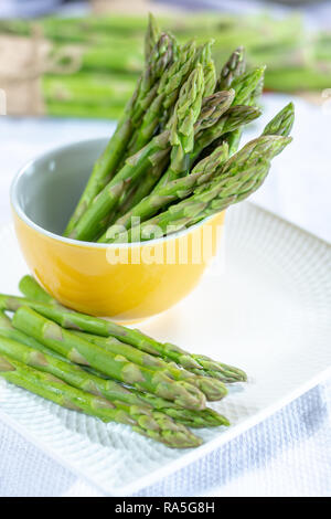 Fresh raw green asparagus vegetable ready to cook close up Stock Photo