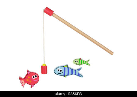 Wood fishing game - catch the fish with the magnetic rod Stock Photo - Alamy
