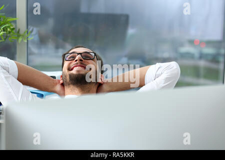 Handsome smiling bearded adult clerk person arms crossed Stock Photo