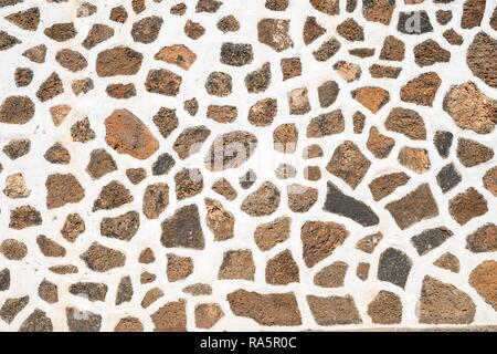 Natural stone wall with wide white joints, Haria, Lanzarote, Canary Islands, Spain Stock Photo