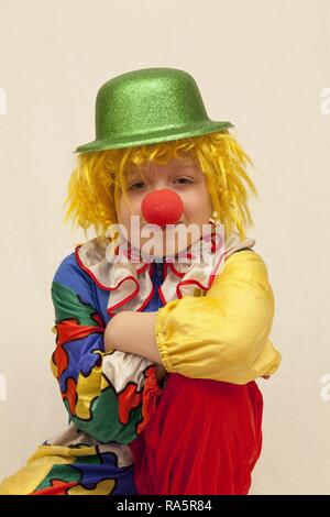 Boy dressed as a clown Stock Photo