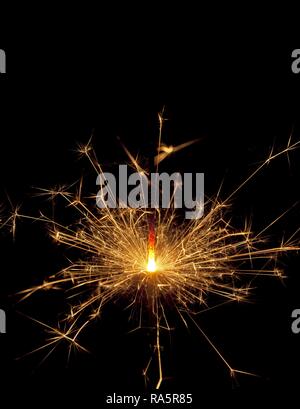 Burning sparkler Stock Photo