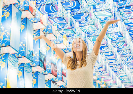 https://l450v.alamy.com/450v/ra5wen/a-young-european-woman-in-the-background-of-asian-lanterns-is-celebrating-the-chinese-new-year-ra5wen.jpg