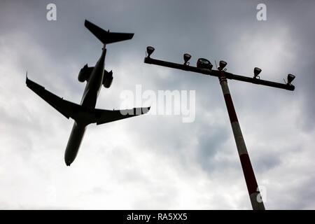 Passenger jet landing at Duesseldorf International Airport, Duesseldorf, North Rhine-Westphalia Stock Photo