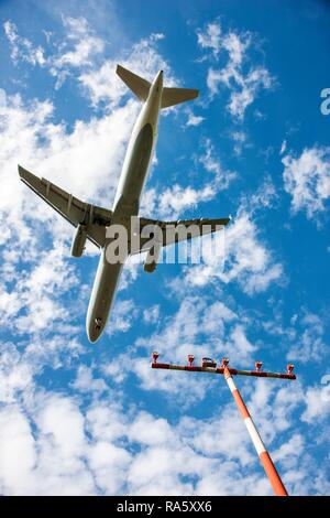 Passenger jet landing at Duesseldorf International Airport, Duesseldorf, North Rhine-Westphalia Stock Photo