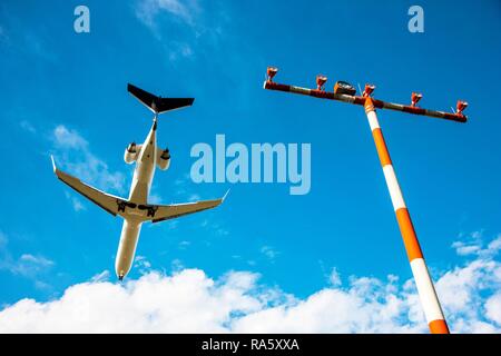 Passenger jet landing at Duesseldorf International Airport, Duesseldorf, North Rhine-Westphalia Stock Photo