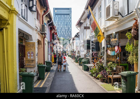 Singapore - 22nd December 2018: Tourists walking in Haji Lane. This is in the Kampong Glam area Stock Photo