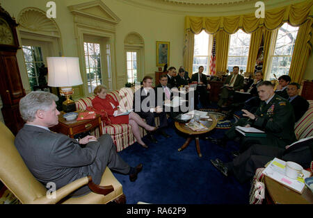 3/26/1999 President William Jefferson Clinton participating in a briefing on Kosovo. Participants include Secretary of State Madeleine Albright, William Cohen, George Tenet, Sandy Berger, John Podesta, Jim Steinberg, and General Henry Shelton.