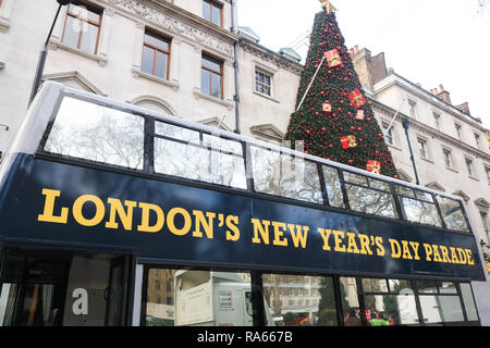 London, UK. 1st Jan, 2019. A double decker bus with the livery for the annual  New Year's Day Parade.This years theme is London Welcomes The World Credit: amer ghazzal/Alamy Live News Stock Photo