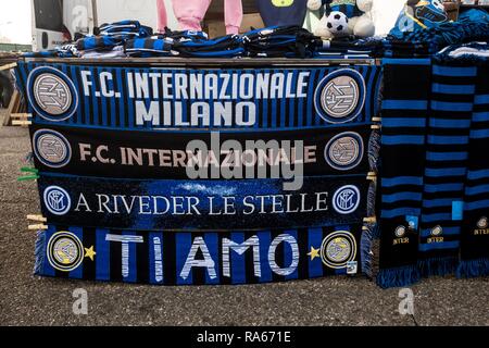 Milan, Italy. 1st January, 2019. Milan, Inter and Juventus t-shirts and gadgets for sale at a street vendor in front of the San Siro stadium, on January 01 2019 Credit: Mairo Cinquetti/Alamy Live News Stock Photo