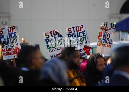 Oakland, California, USA. 1st Jan, 2019. A crowd gathered outside the Fruitvale BART station in Oakland, California, to mark the tenth anniversary since Oscar Grant was killed there by a BART police officer. Credit: Scott Morris/Alamy Live News Stock Photo