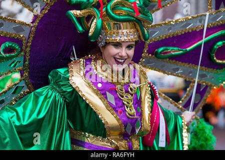 Philadelphia, Pennsylvania, USA. 1st Jan, 2019. A performer shows off her costume during the Philadelphia Mummers Parade, a New Years Day tradition.Hundreds of performers, comics and musicians gathered for the 118th annual Philadelphia Mummers Parade.The annual New Year's Day tradition gathers diverse brigades from neighborhoods across Philadelphia together in one of the United State's oldest folk festivals. In addition to colorful costumes, mummers perform skits and play musical instruments. Credit: Ellie Van Houtte/SOPA Images/ZUMA Wire/Alamy Live News Stock Photo