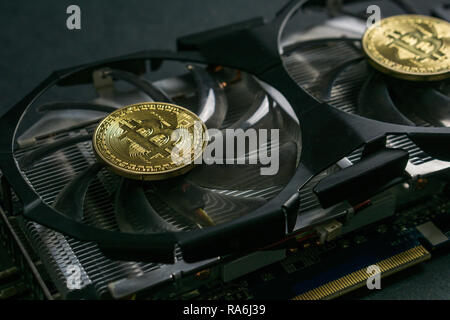 Bitcoin coin on GPU, Cryptocurrency Mining Using Graphic Cards Stock Photo