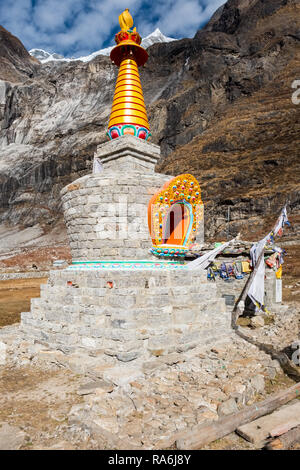 Commemorative Buddhist stupa near the site of the landslide in the Langtang Valley Nepal that wiped out a village in the 2015 earthquake Stock Photo