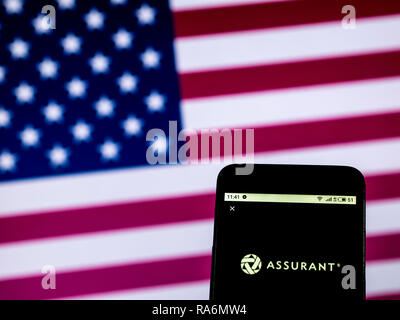 Assurant Insurance company logo seen displayed on smart phone Stock ...