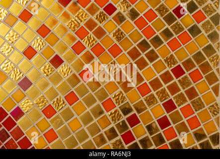 Colorful golden ceramic mosaic using in pool background Stock Photo