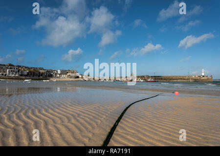 Ripples in the Sand on a sunny day St Ives Harbour Cornwall UK Stock Photo