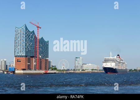 Cruise ship Queen Elizabeth, port with Elbe Philharmonic Hall, Hamburg, Germany Stock Photo
