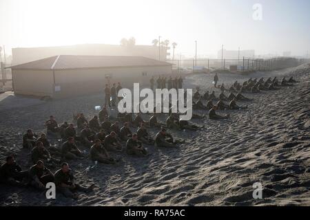 U.S. Navy SEAL candidates participate in Basic Underwater Demolition SEAL training at the Navy Special Warfare Center April 9, 2018 in Coronado, California. SEALs are the maritime component of U.S. Special Forces and are trained to conduct a variety of operations from the sea, air and land. Stock Photo