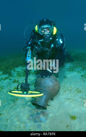 Diver with metal detector looking for a treasure under water, Lake Baikal, Siberia, Russia, Eurasia Stock Photo