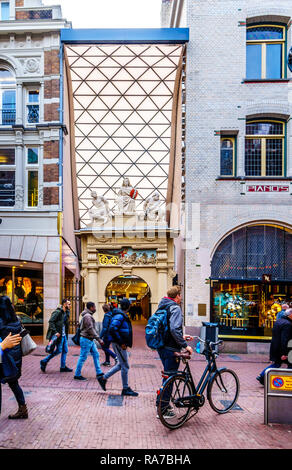 The entrance to the Kalverpassage a shooping mall on the Kalverstraat, a famous shopping street in the center of the old city of Amsterdam in Holland Stock Photo