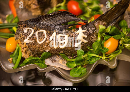 Main care with fish hi-res stock photography and images - Alamy
