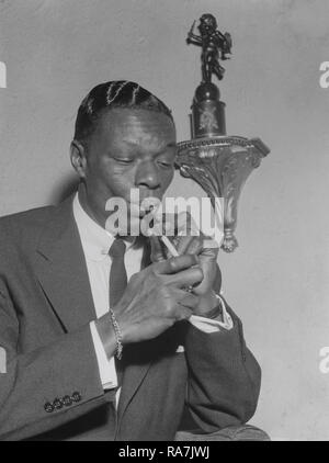 Nat King Cole. March 17, 1919 - Febryary 15, 1965. American jazz pianist and singer. Pictured here during a visit to Stockholm Sweden 1954 when performing there. Photo Kristoffersson. Stock Photo