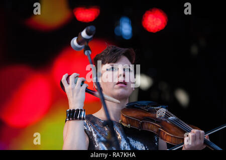 The Canadian indie rock band Arcade Fire performs a live concert at the Danish music festival Northside 2014. Here musician Sarah Neufeld is seen live on stage. Denmark, 15/06 2014. EXCLUDING DENMARK Stock Photo