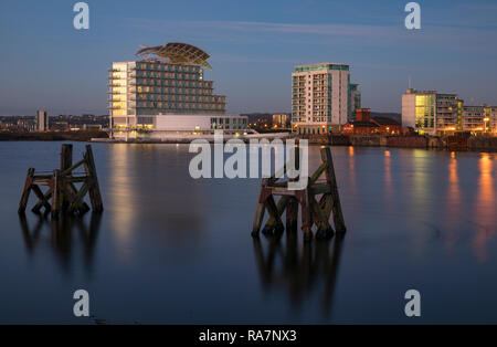View across Cardiff Bay to St. David's Hotel & Spa and Ocean Reach apartments, Cardiff, Wales, UK Stock Photo